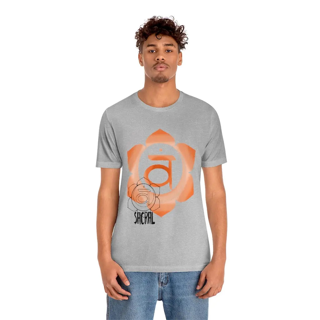 Male model wearing the Sacral Chakra T-Shirt in a relaxed, joyful pose, highlighting the artistic design.