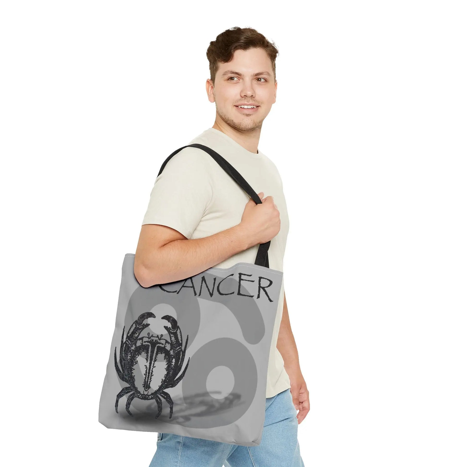 Lifestyle with Man: Man carrying the Cancer Zodiac Tote Bag to show scale and style.
