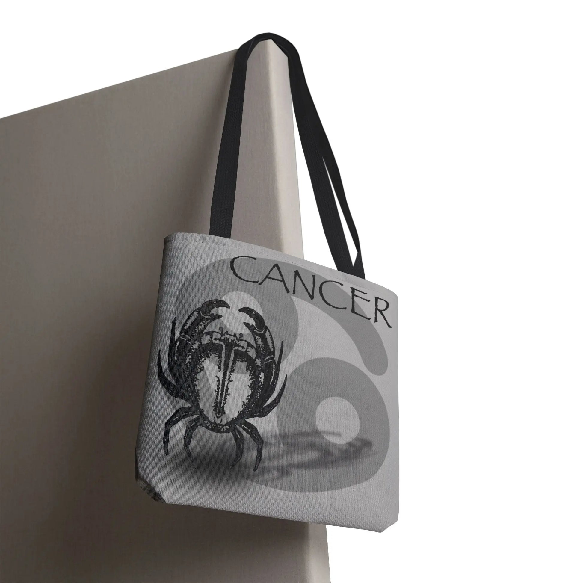 Cancer Zodiac Tote Bag - Back view depicting the tote hanging off a door.