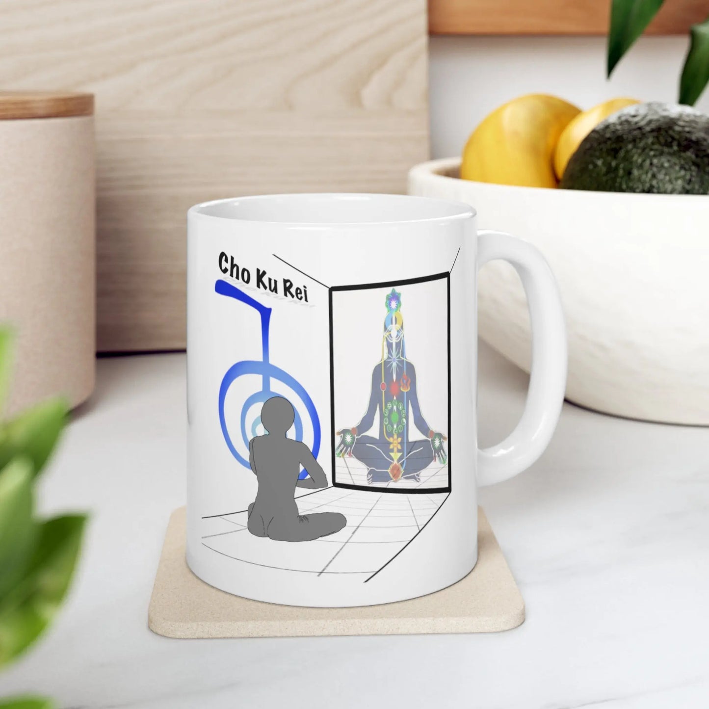 Cho Ku Rei Reiki Mug - Left side with meditative art, shown resting on a coaster.