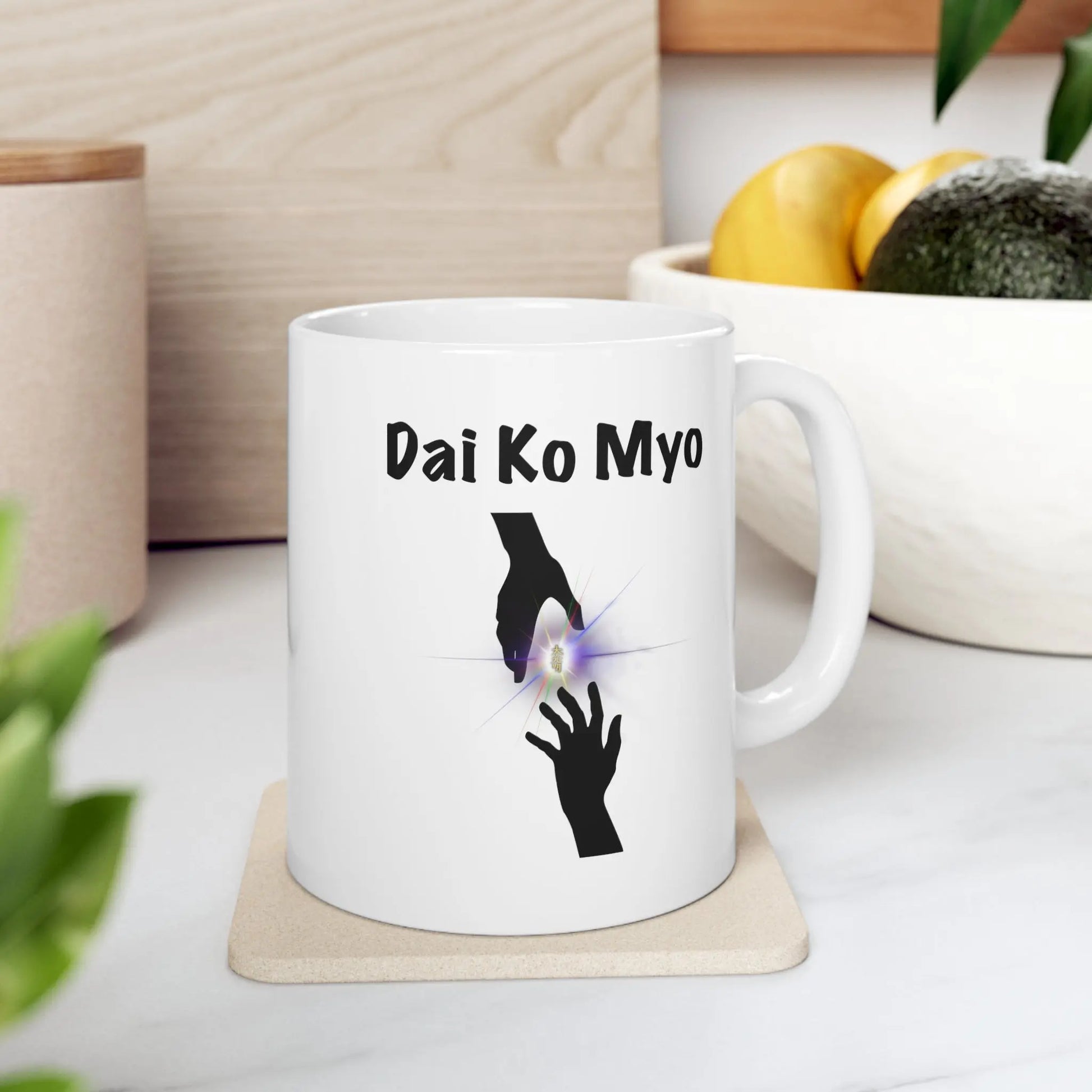 Dai Ko Myo Reiki Mug - Left side with "Dai Ko Myo" art, shown resting on a coaster.