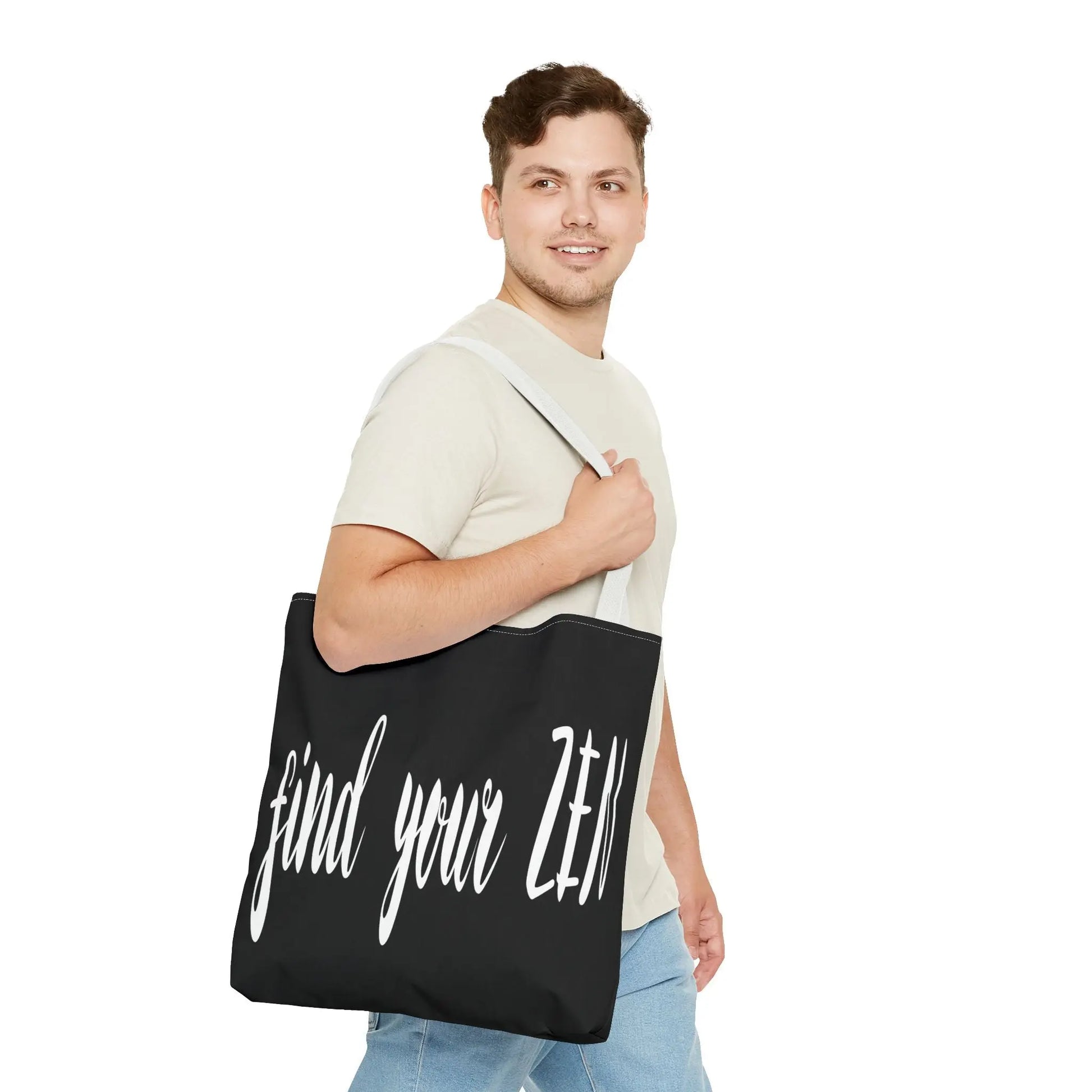 Man carrying the "Find Your Zen" Tote Bag to show scale and minimalist style.