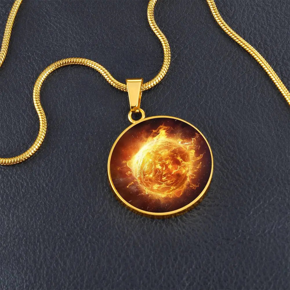Gold Fire Element Necklace shown in a lifestyle setting.