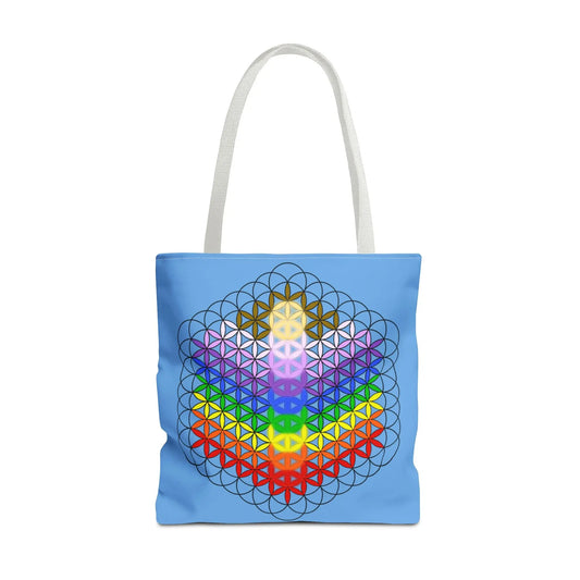 Flower of Life Tote Bag - Front view showing the chakra-colored sacred geometry symbol on a light blue canvas.