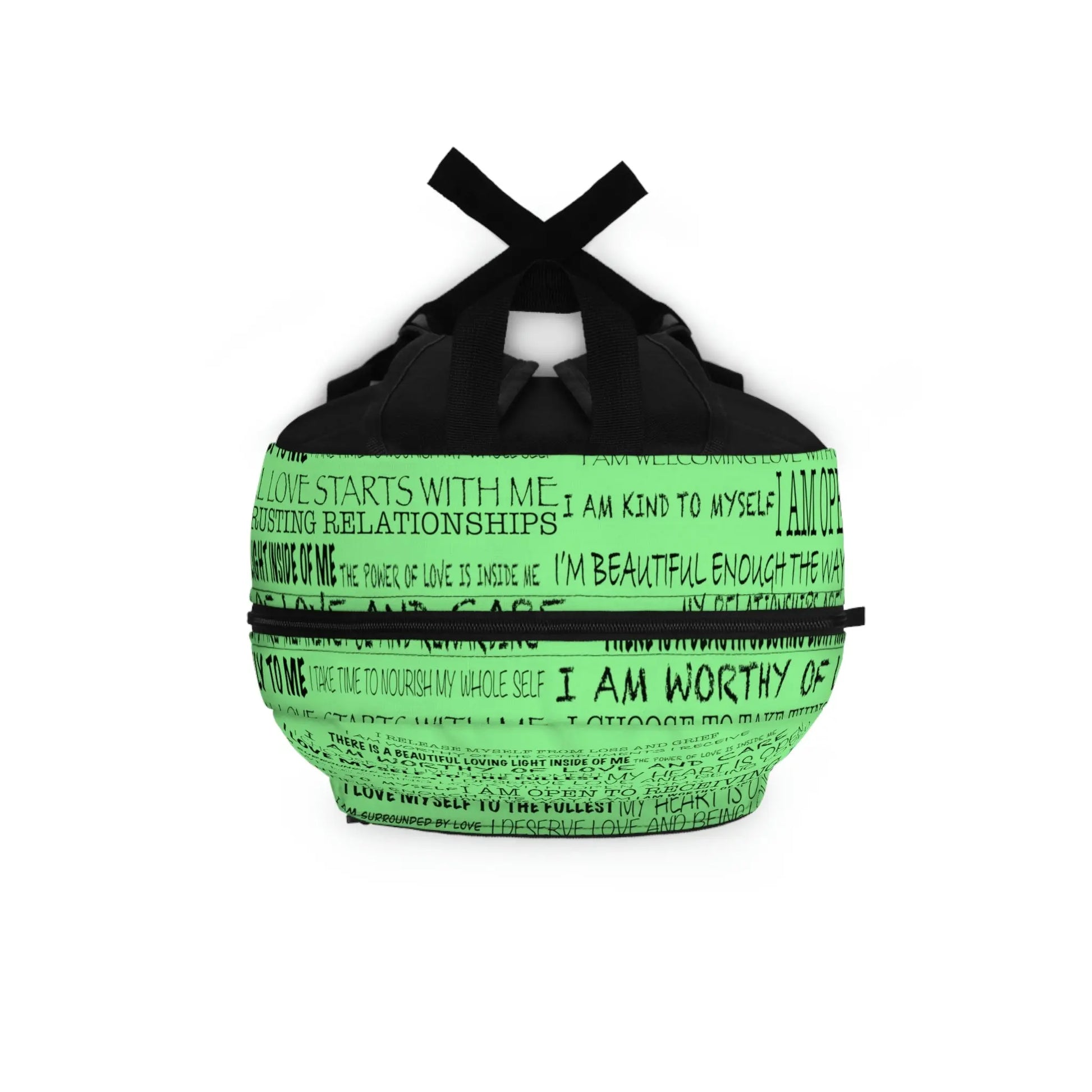 Top-down view of the green Heart Chakra Affirmations Backpack, showing the main zipper opening.