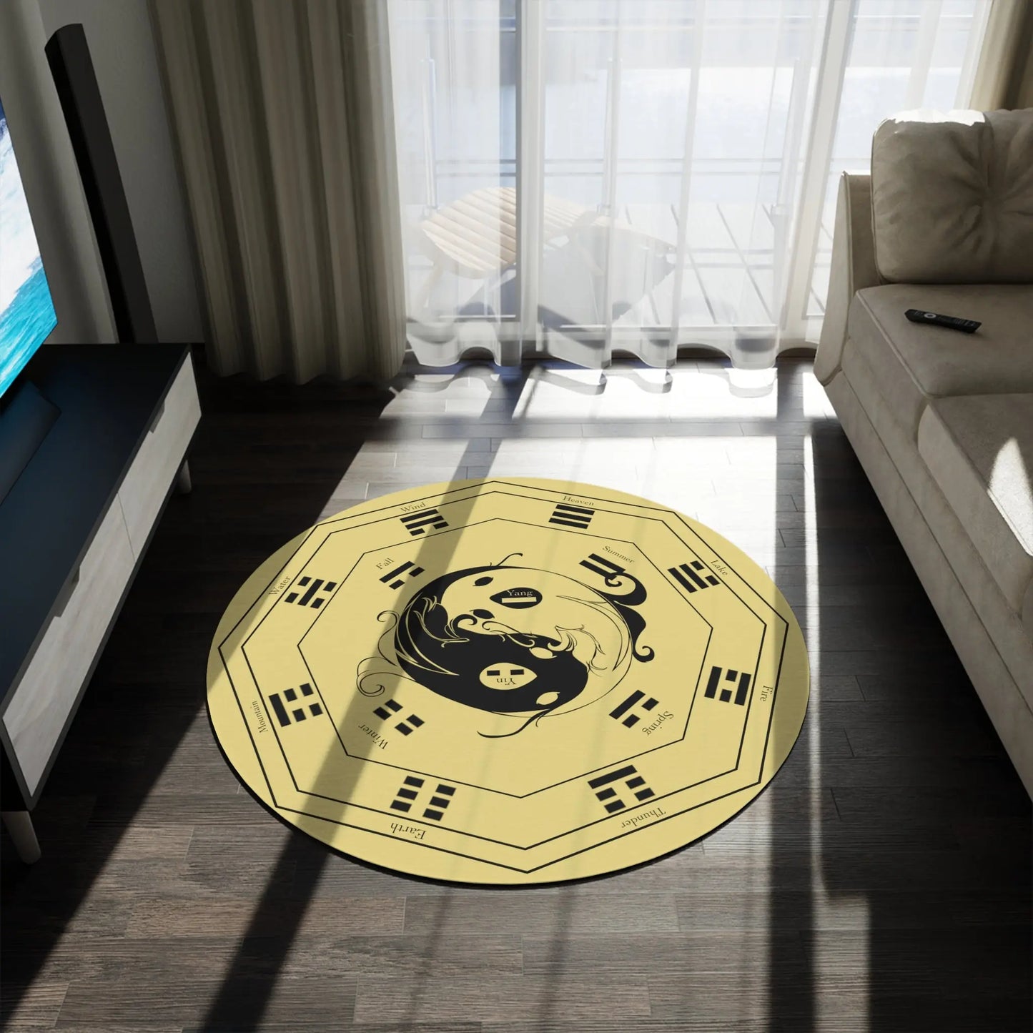 The 60x60" "I Ching" Rug shown in a modern living room next to a sofa.