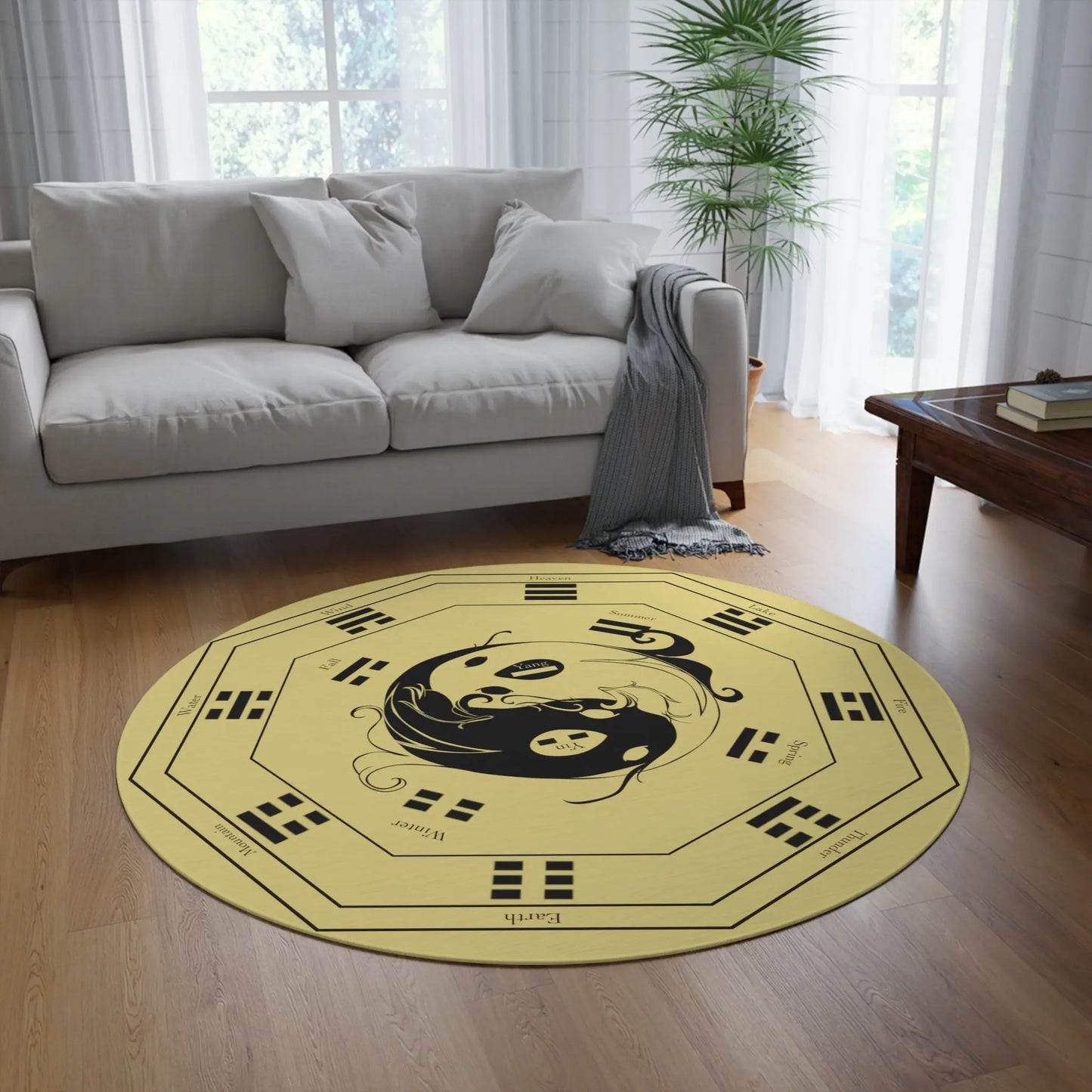 A different living room setting featuring the "I Ching" Round Rug as a centerpiece.