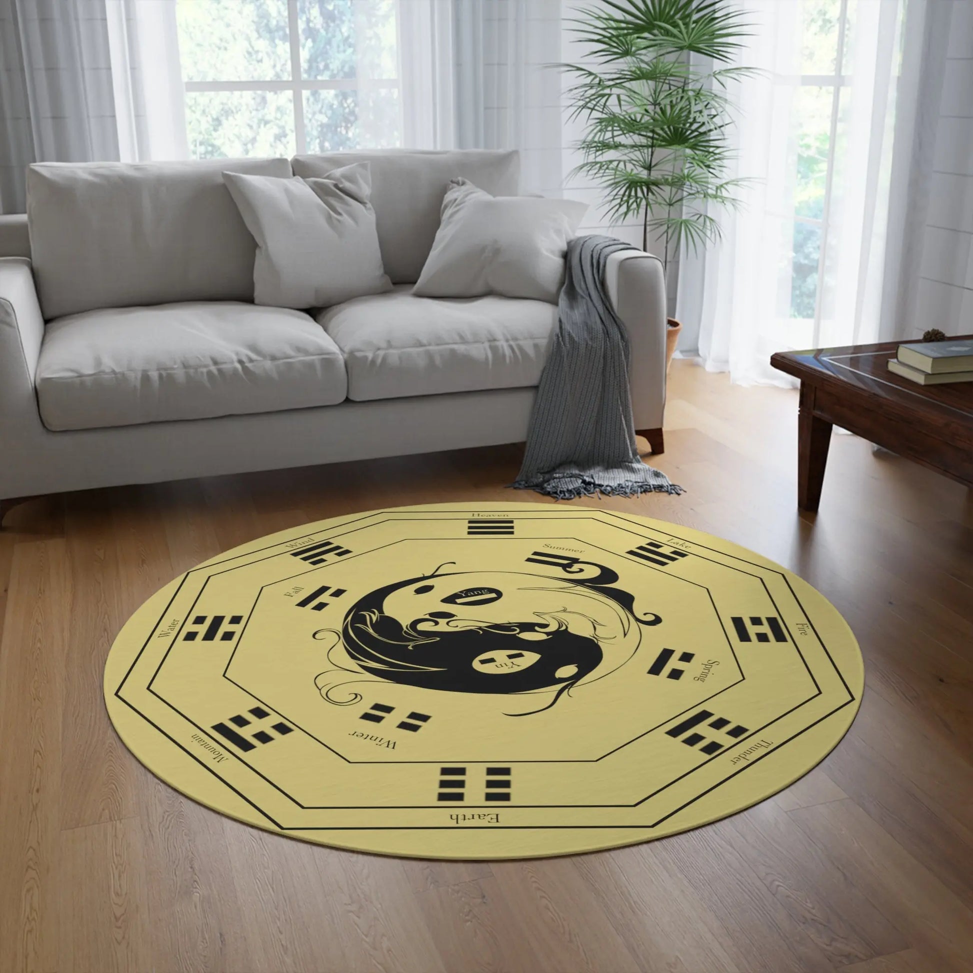 A different living room setting featuring the "I Ching" Round Rug as a centerpiece.