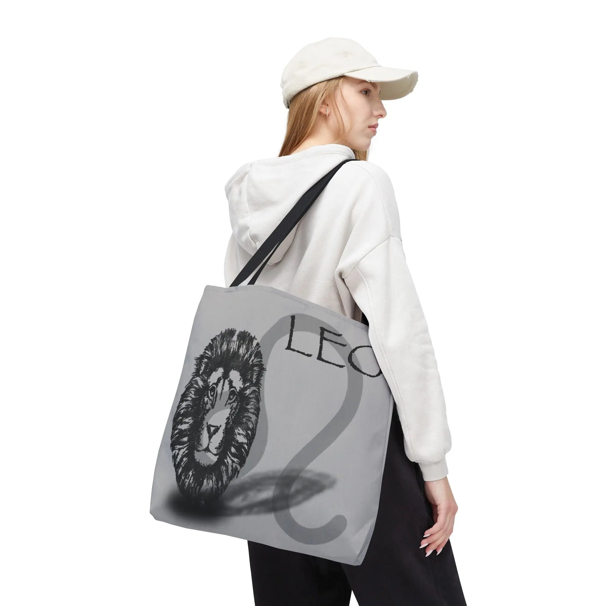 Woman carrying the Leo Zodiac Tote Bag over her shoulder.
