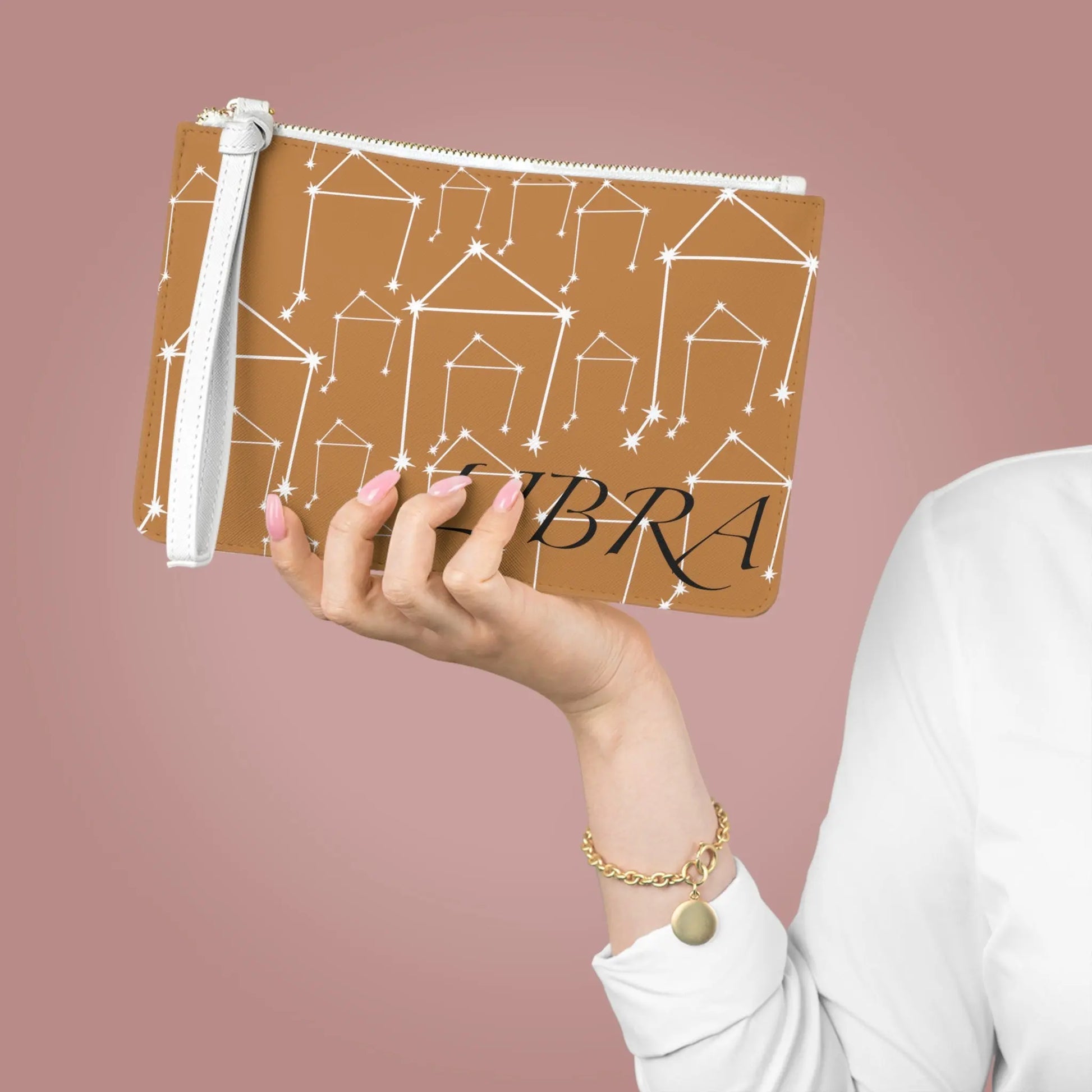 Large Libra Zodiac Clutch held by a woman to show its scale.