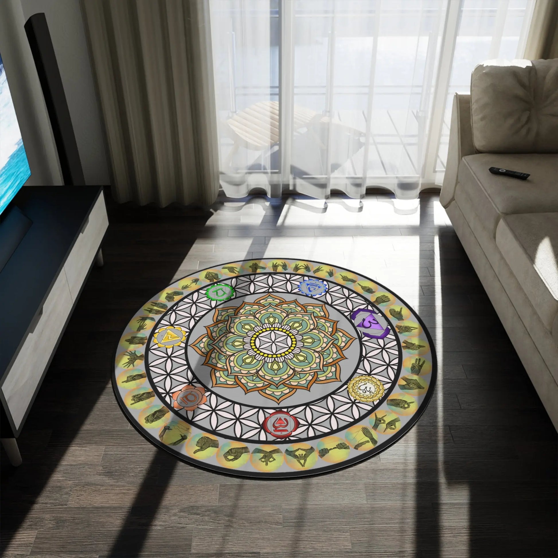 The 60x60" "Mudras & Flower of Life" Rug shown in a modern living room next to a sofa.