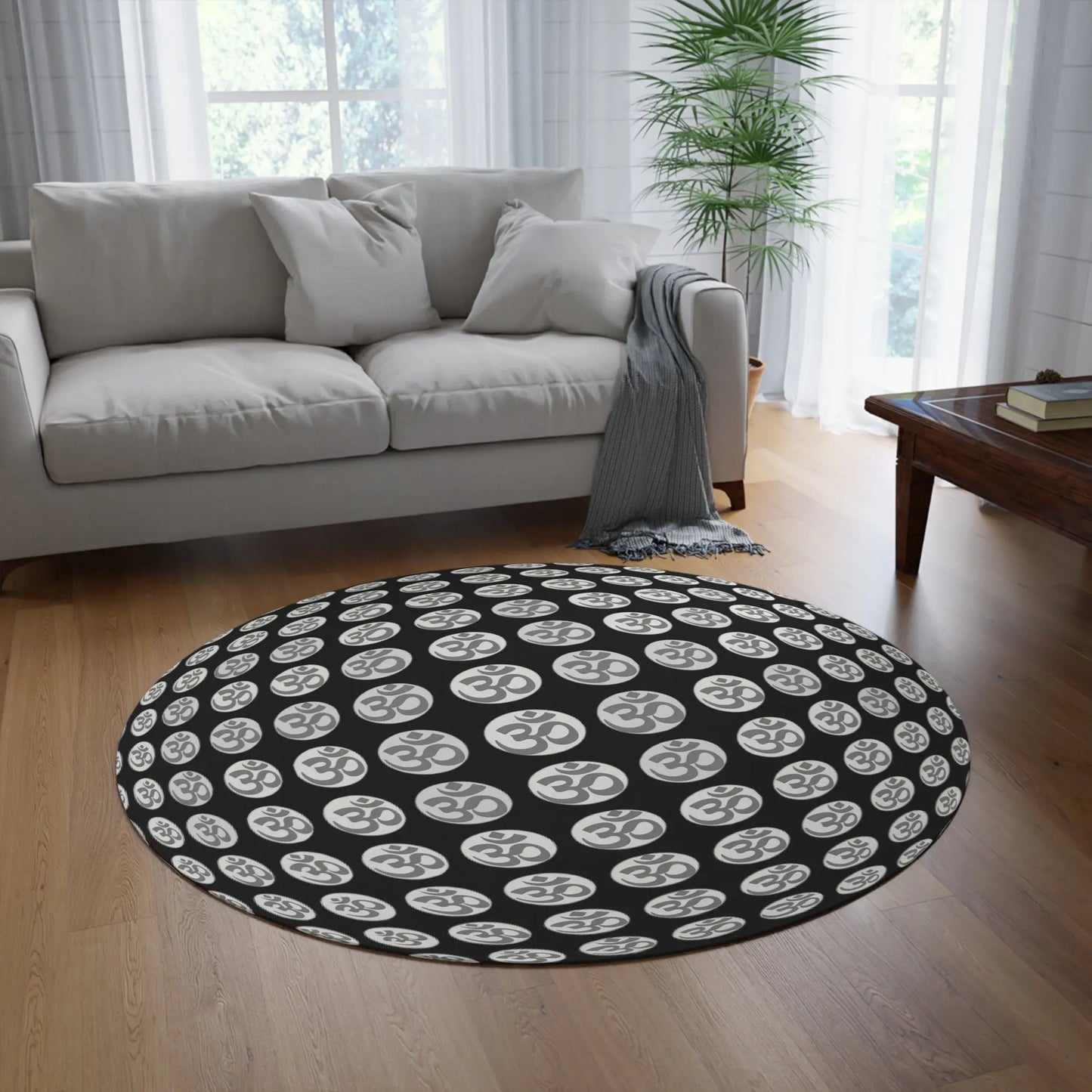 A different living room setting featuring the "OM Symbol" Round Rug as a centerpiece.