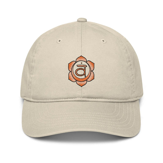 Oyster-colored Sacral Chakra Baseball Cap - Front view with the Sacral Chakra symbol.
