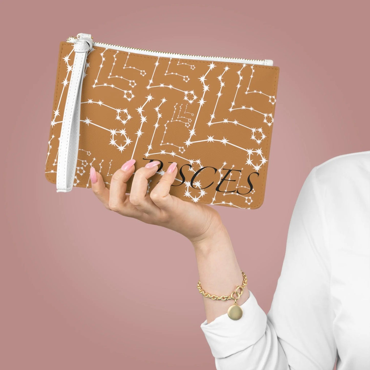 Large Pisces Zodiac Clutch held by a woman to show its scale.
