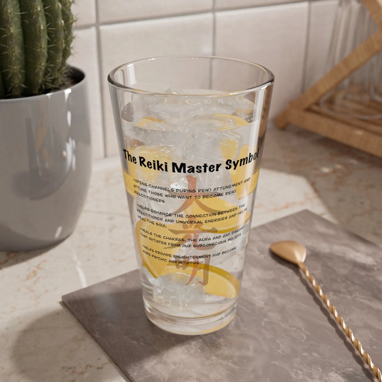 Dai Ko Myo Reiki Master Symbol Glass in a lifestyle setting with bar tools.