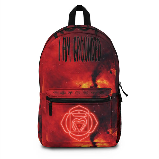 Red Root Chakra Cosmic Backpack - Front view showing the galaxy print and chakra emblem on the pocket.