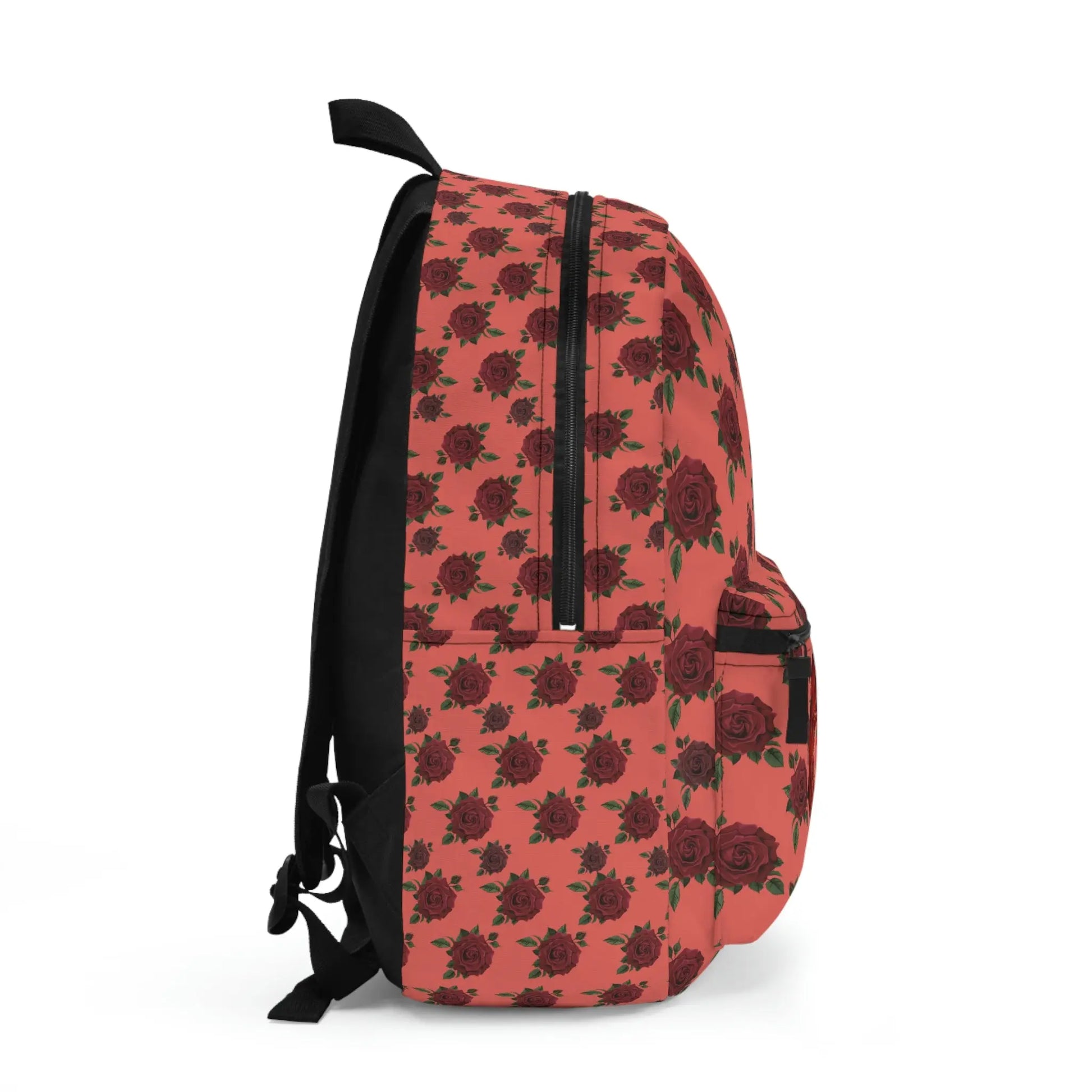 Red Root Chakra Backpack - Right side profile showing the rose print pattern and strap details.