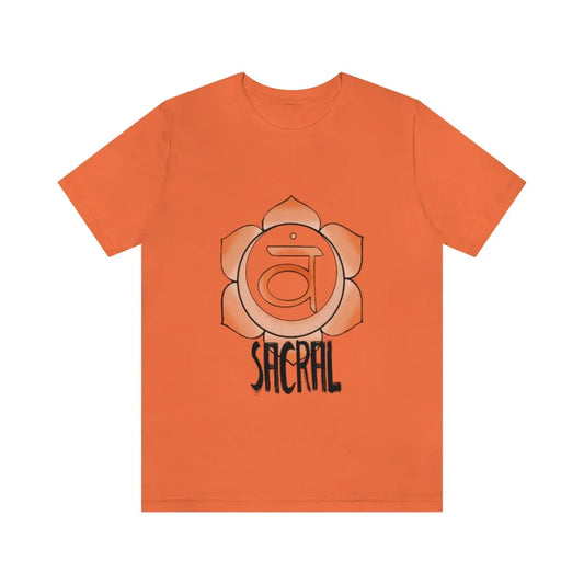 Sacral Chakra T-Shirt in orange on a flat background, showcasing the vibrant Muladhara symbol.