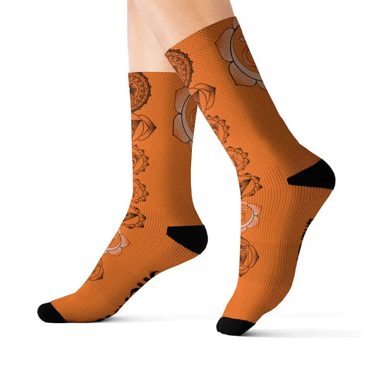 Model (White Background): Model wearing the orange Sacral Chakra Socks to showcase the fit and vibrant design.