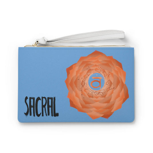 Sacral Chakra Clutch - Front view of light blue vegan leather purse with orange Sacral Chakra symbol print.