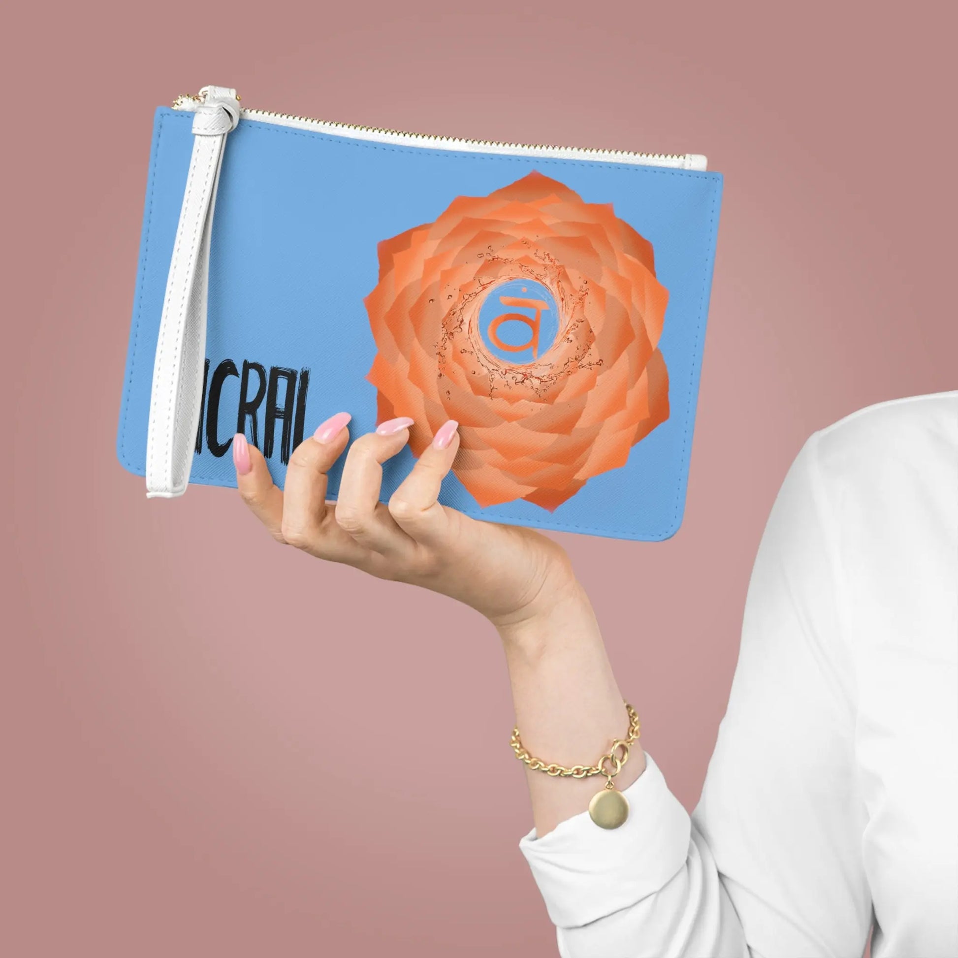 Large Sacral Chakra Clutch held by a woman to show its scale.