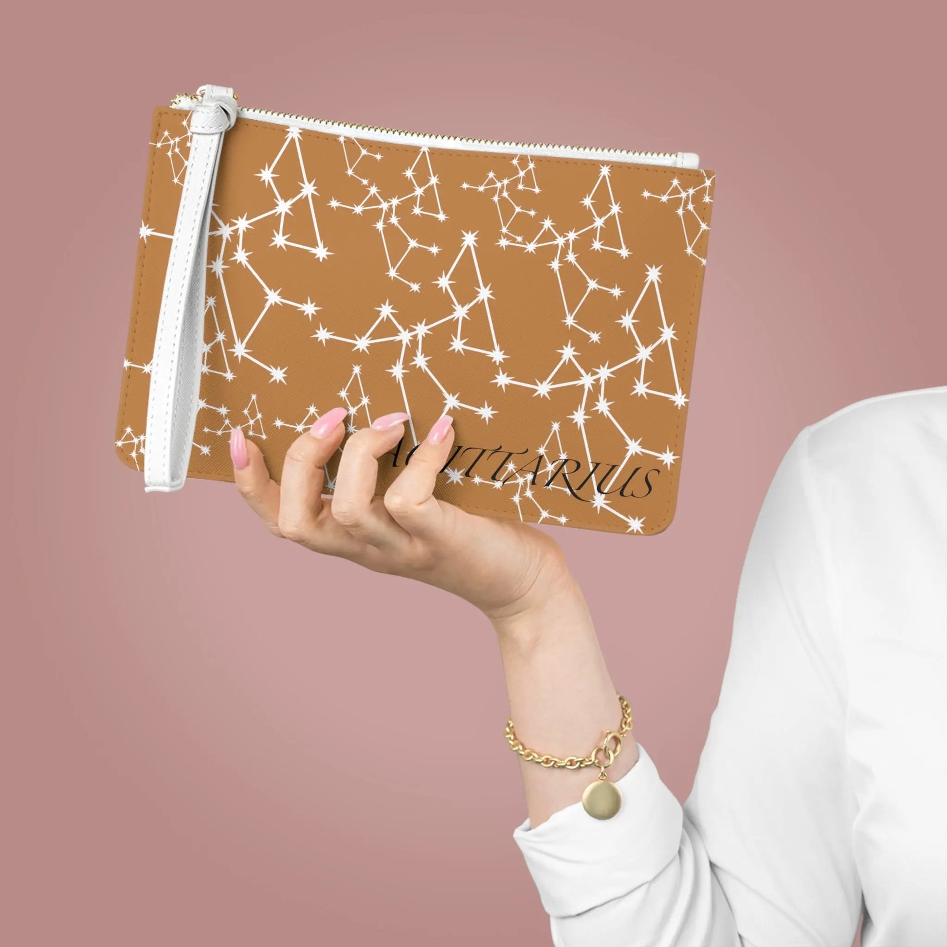 Large Sagittarius Zodiac Clutch held by a woman to show its scale.