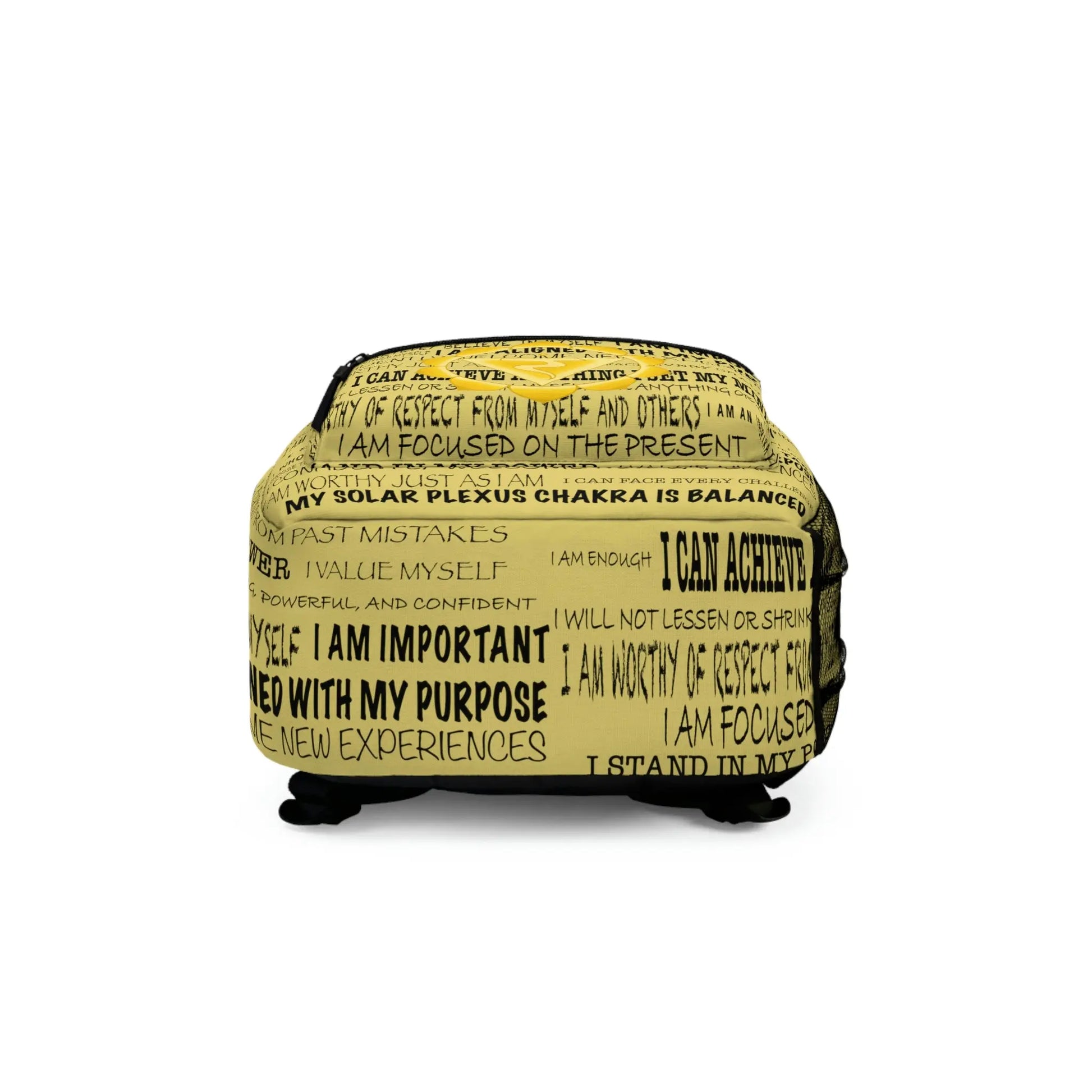 Bottom view of the yellow Solar Plexus Affirmations Backpack, showing the durable base construction.