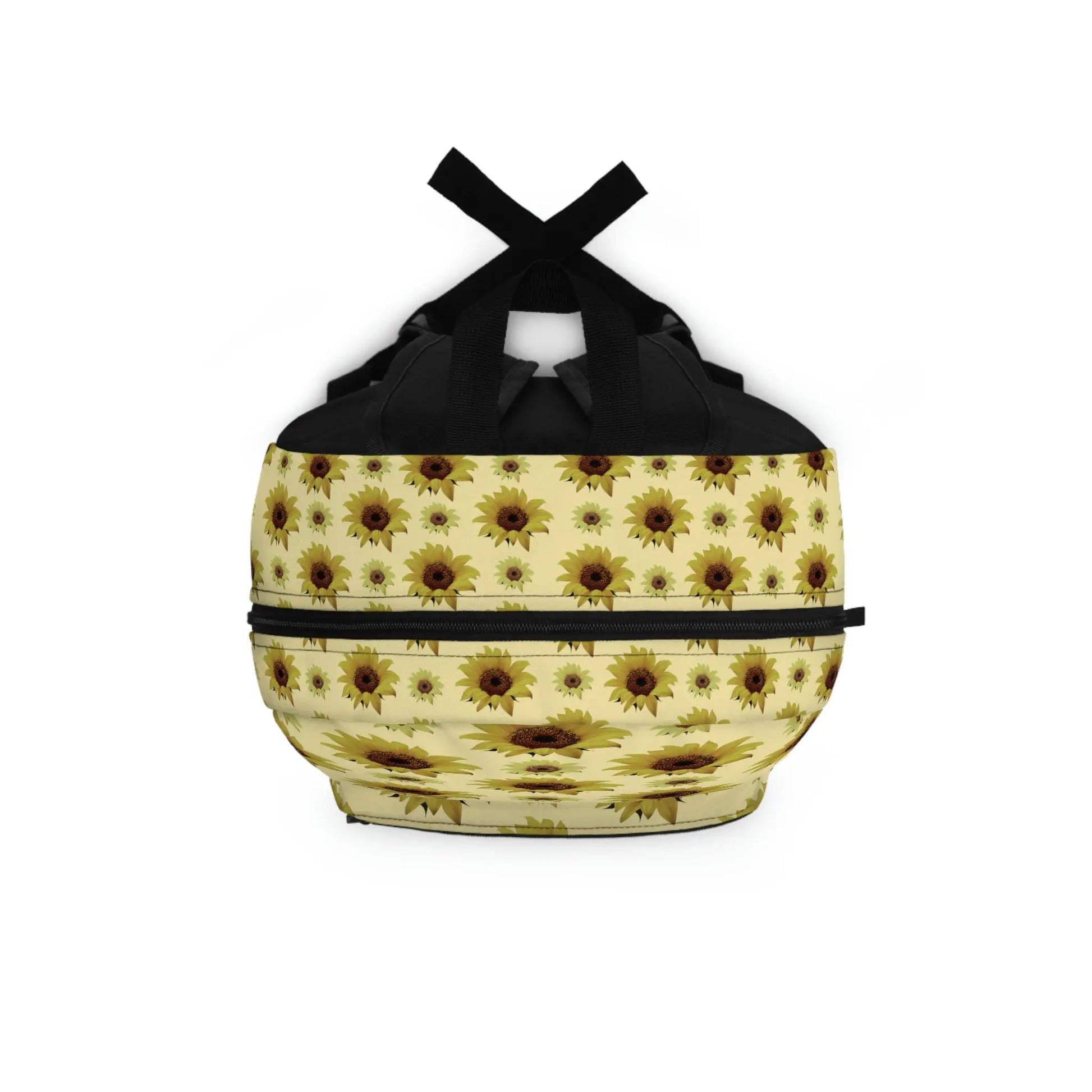 Top-down view of the yellow Solar Plexus Backpack, showing the main zipper opening and sunflower print.