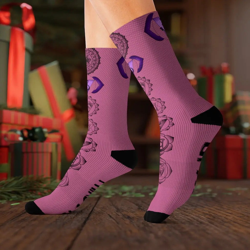 Model (Lifestyle): Model wearing the indigo Third Eye Chakra Socks in a festive setting with wrapped Christmas presents in the background.