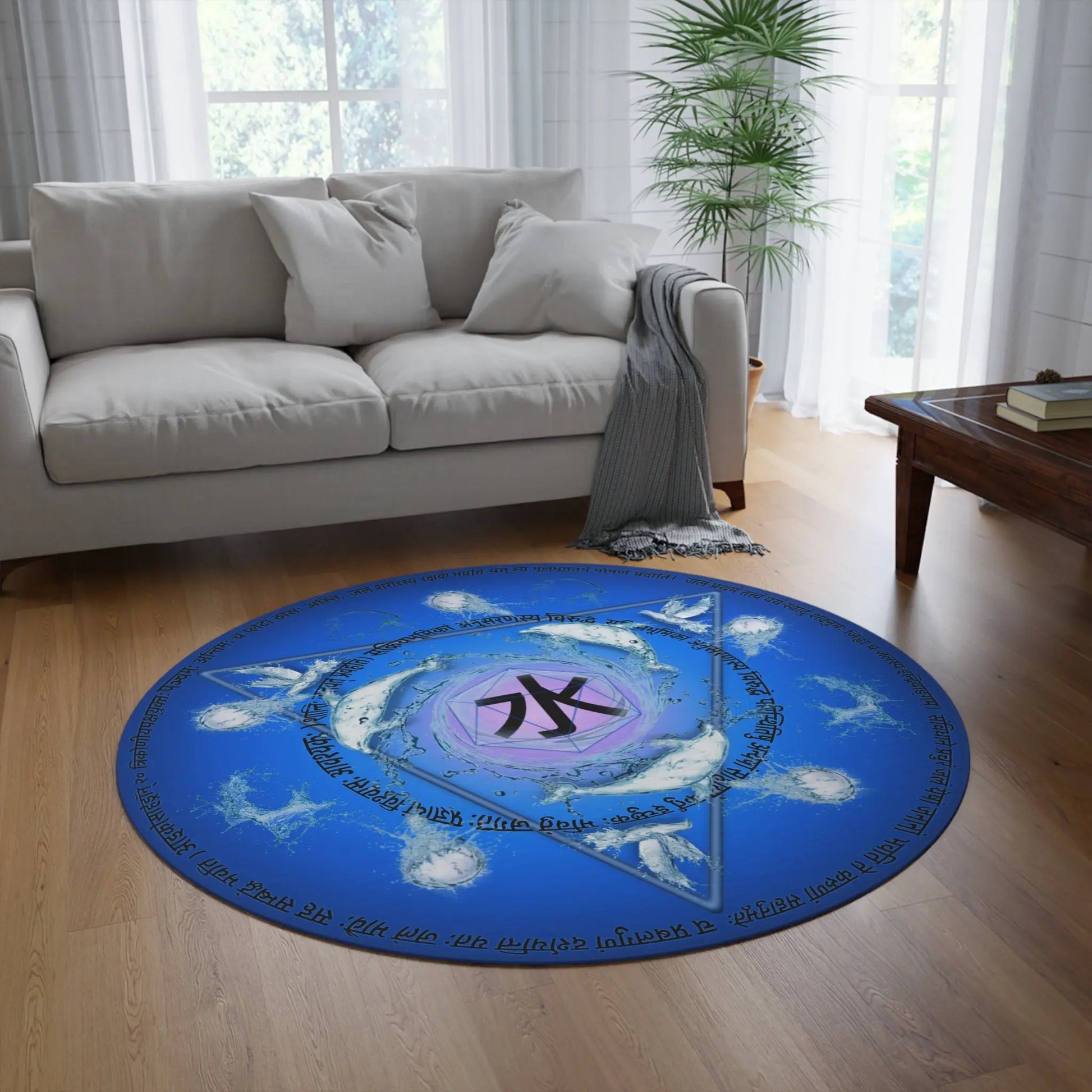 A different living room setting featuring the "Water Element" Round Rug as a centerpiece.