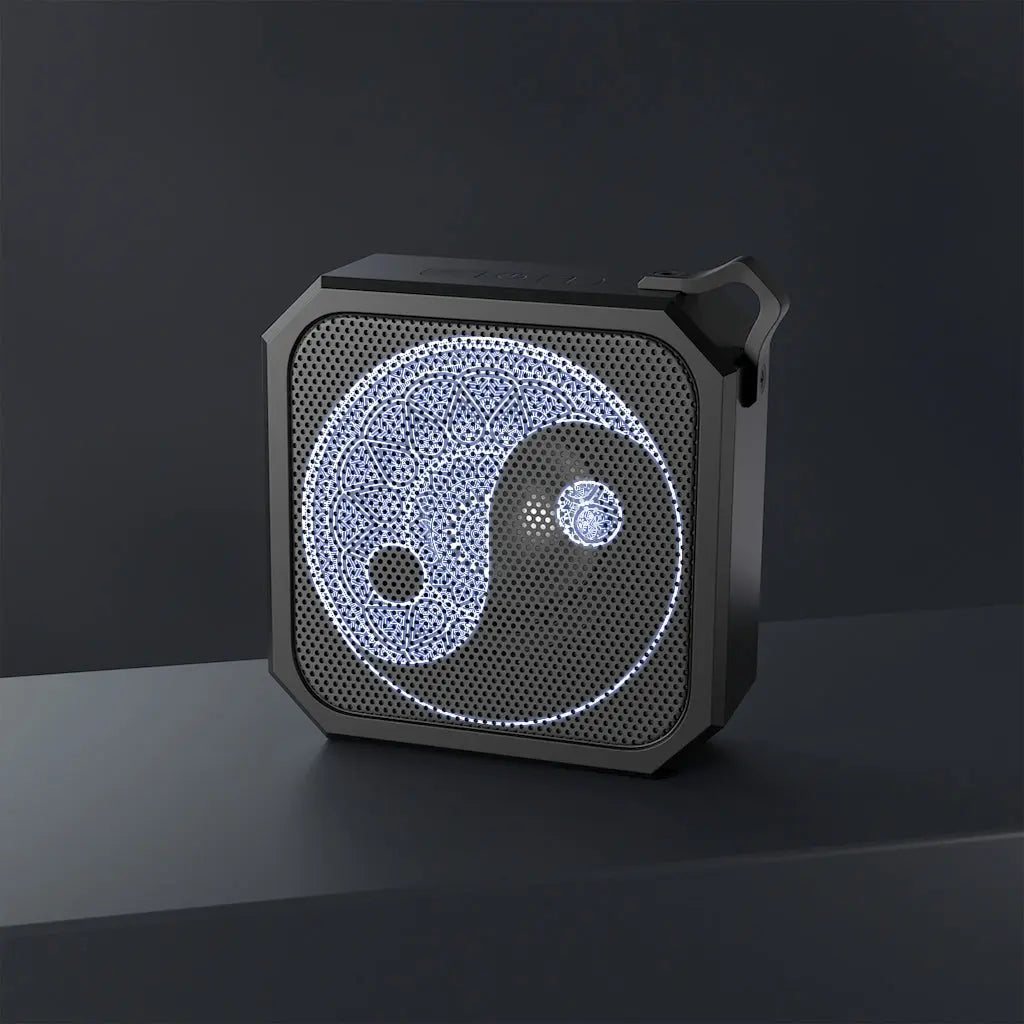 "Yin Yang Mandala" Bluetooth Speaker on a black platform, highlighting the detailed design.