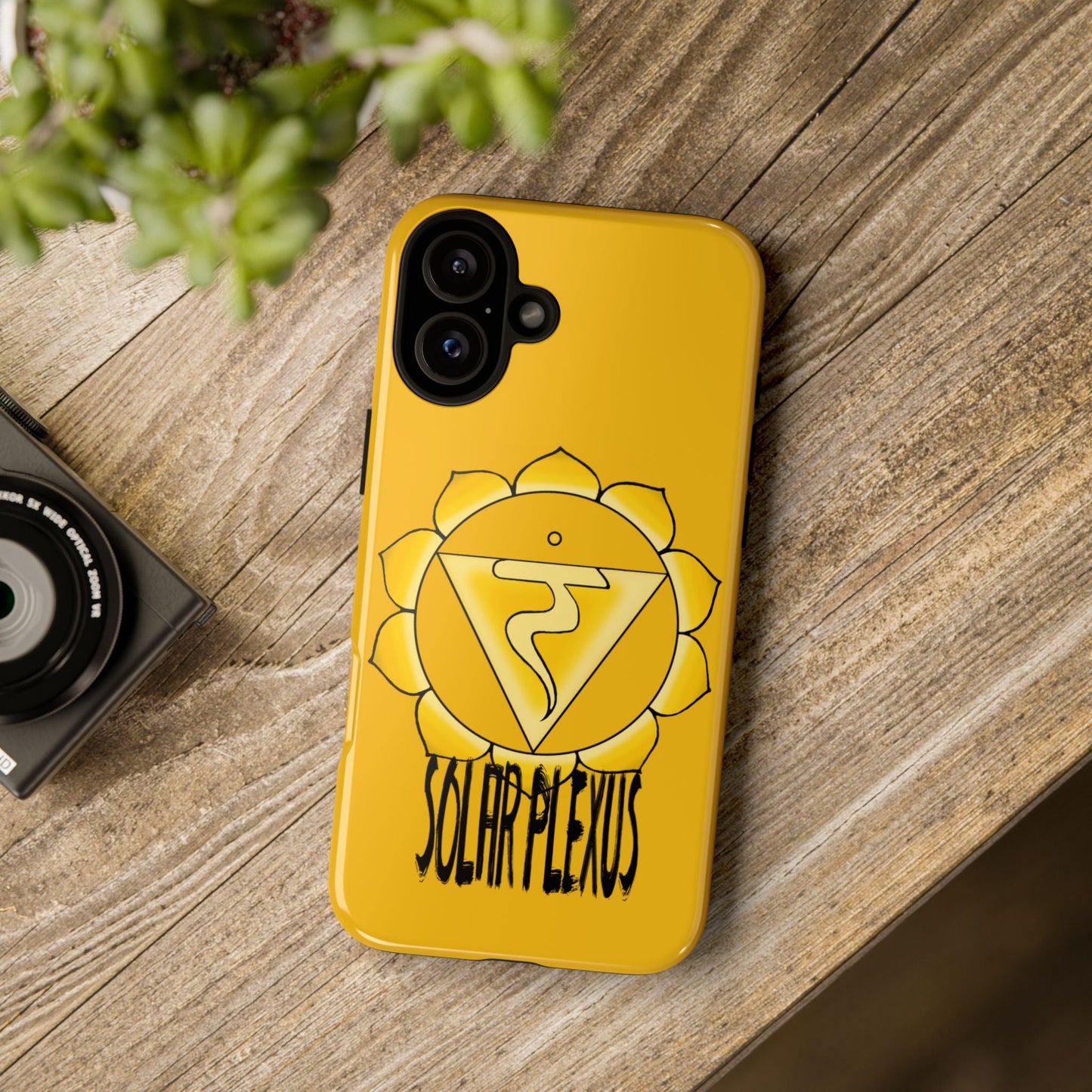 Solar Plexus Chakra Phone Case - Manipura on a wooden table