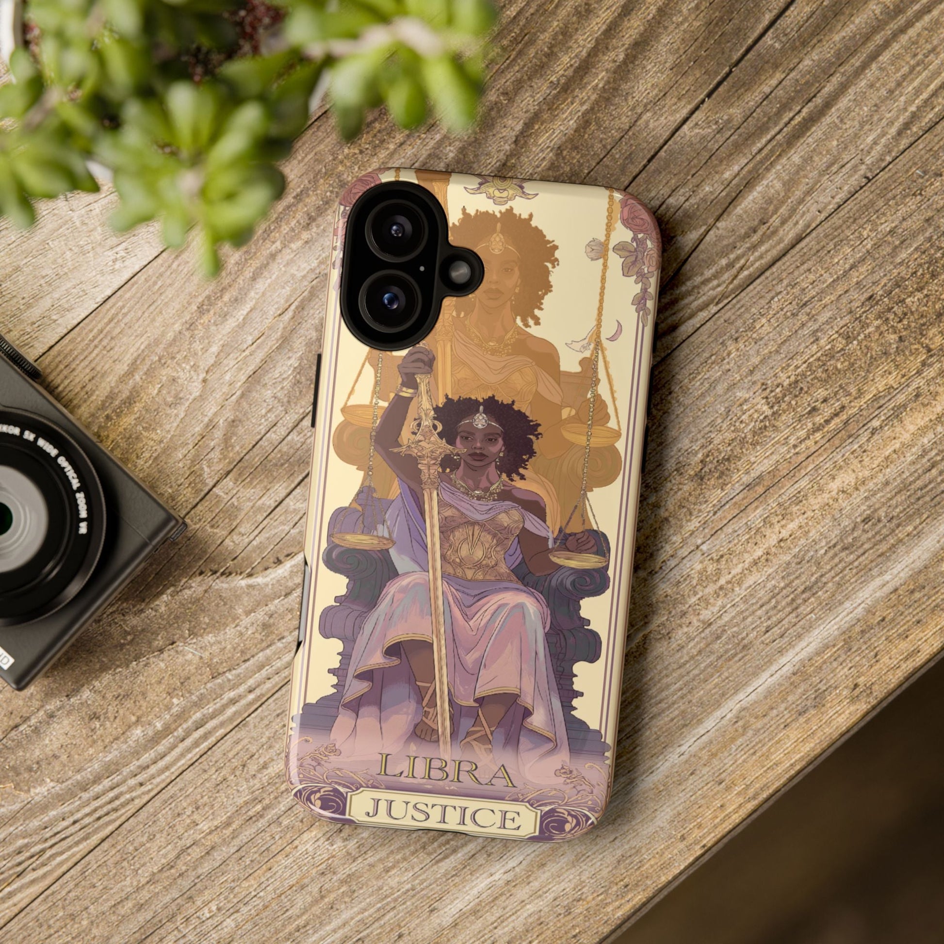 Libra "Justice" Tarot Card Phone Case on a wooden table