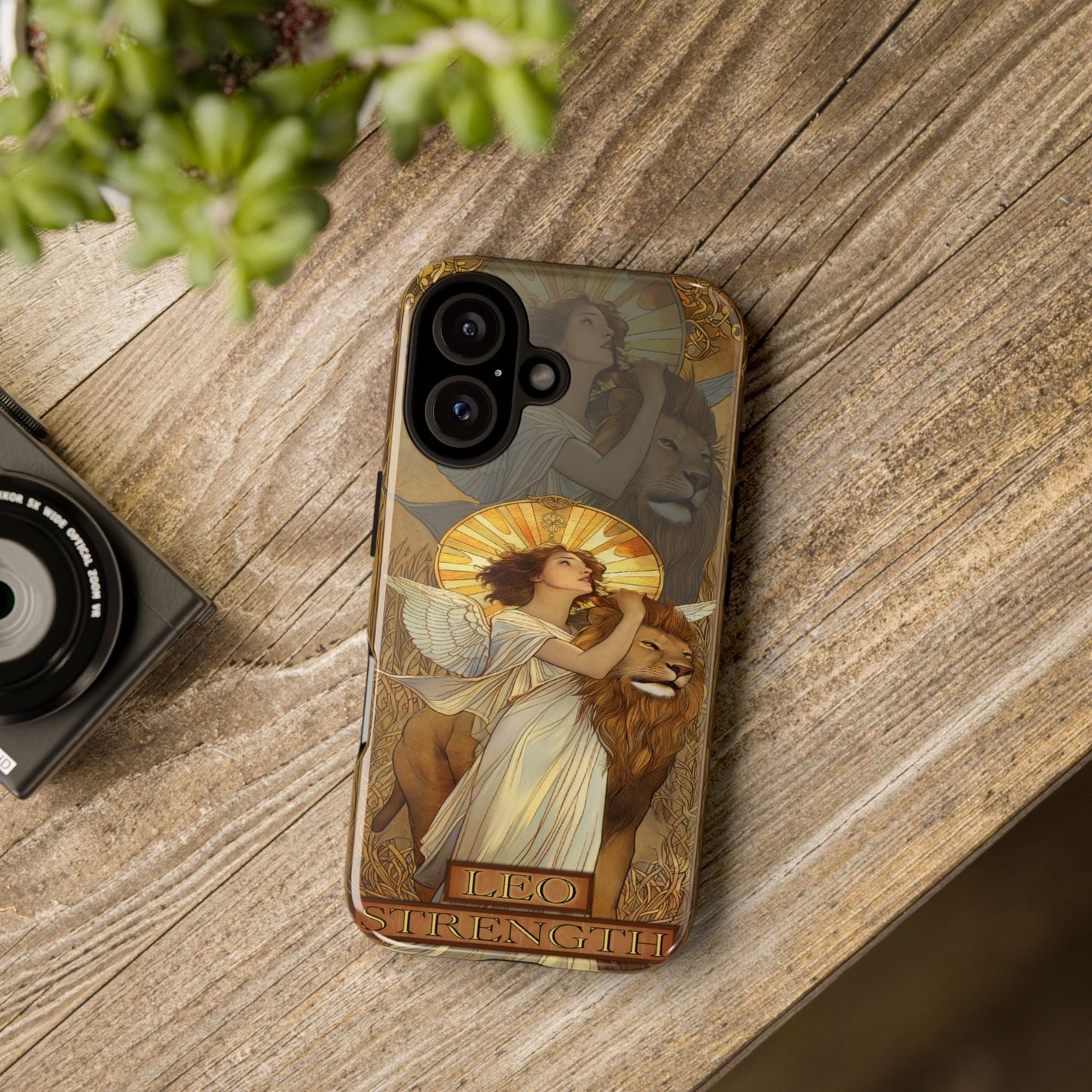 Leo "Strength" Tarot Card Phone Case On a wooden table 