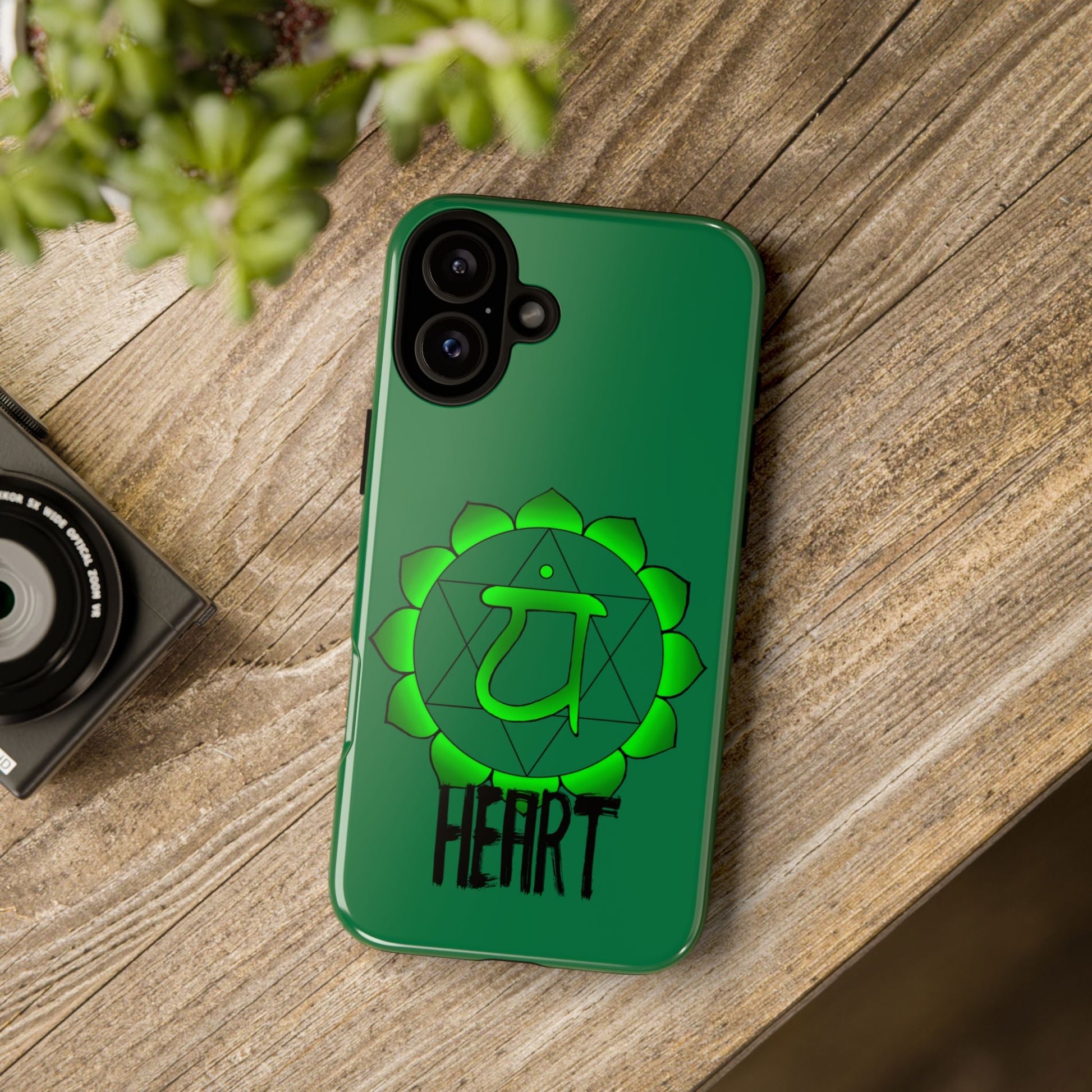 Heart Chakra Phone Case - Anahata on a wooden table 